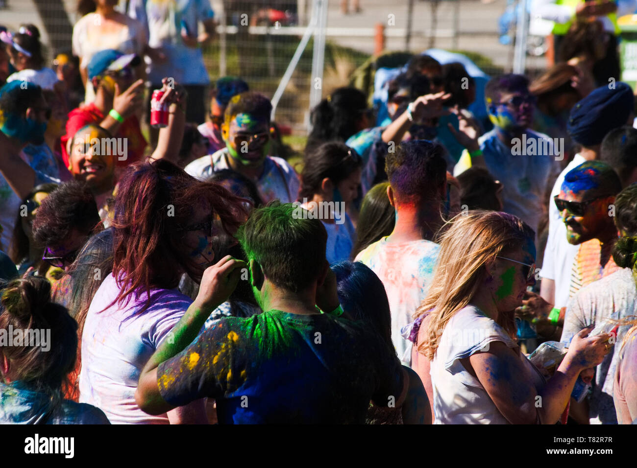 Holi festival of color in Melbourne, St. Kilda, dancing Stock Photo - Alamy