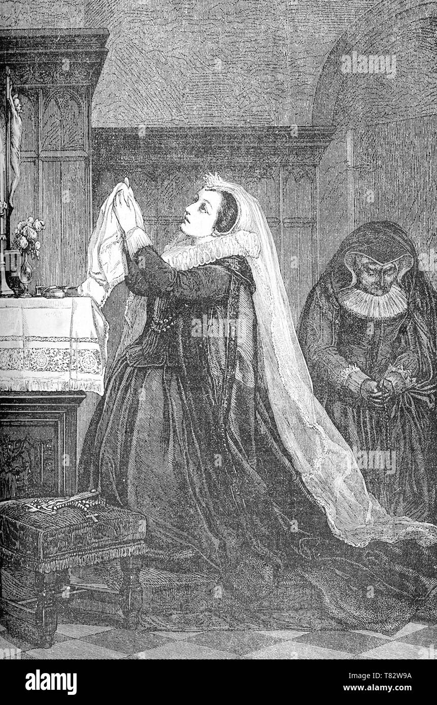 Mary Stuart Queen Of Scots Imprisoned Prays The Crucifix While A Lady In Waiting Says The Rosary Stock Photo Alamy