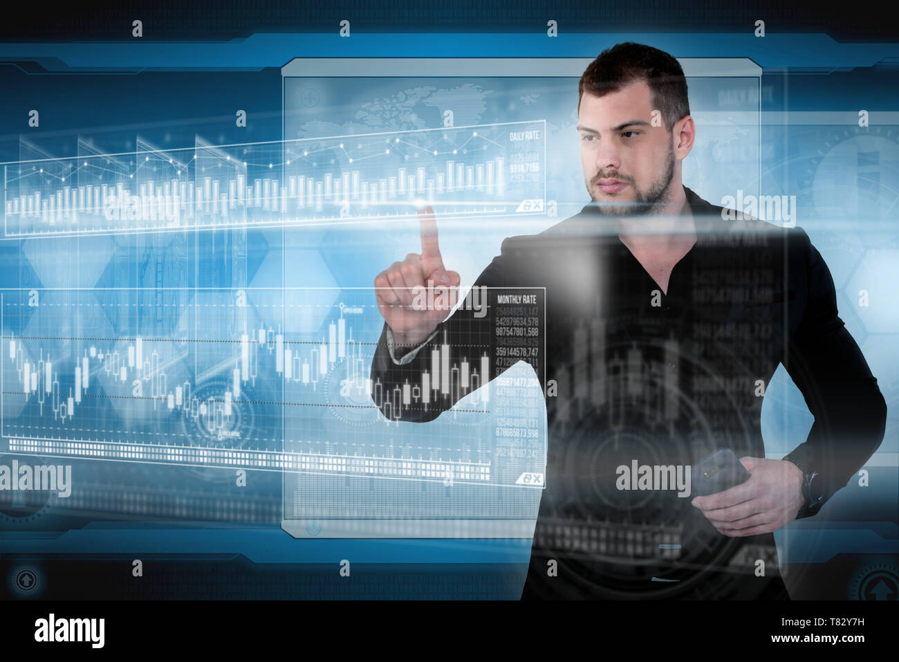 Businessman works with virtual holographic interface. Future technology concept Stock Photo