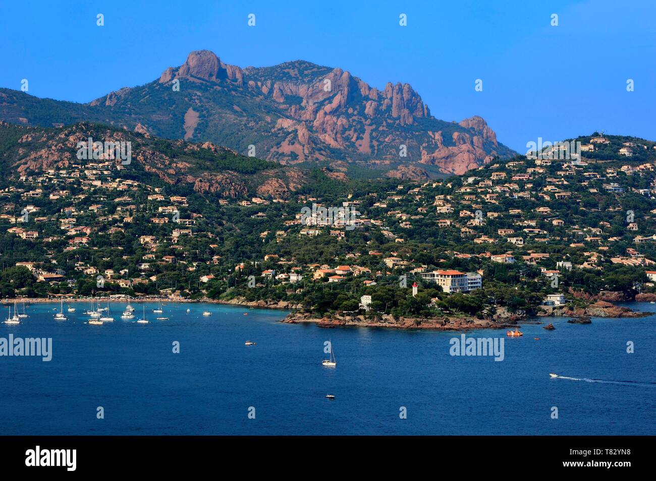 France, Var, Agay area next to Saint Raphael, Massif de l'Esterel (Esterel  Massif), the harbor and village of Agay, the peak of Cap Roux in the  background Stock Photo - Alamy