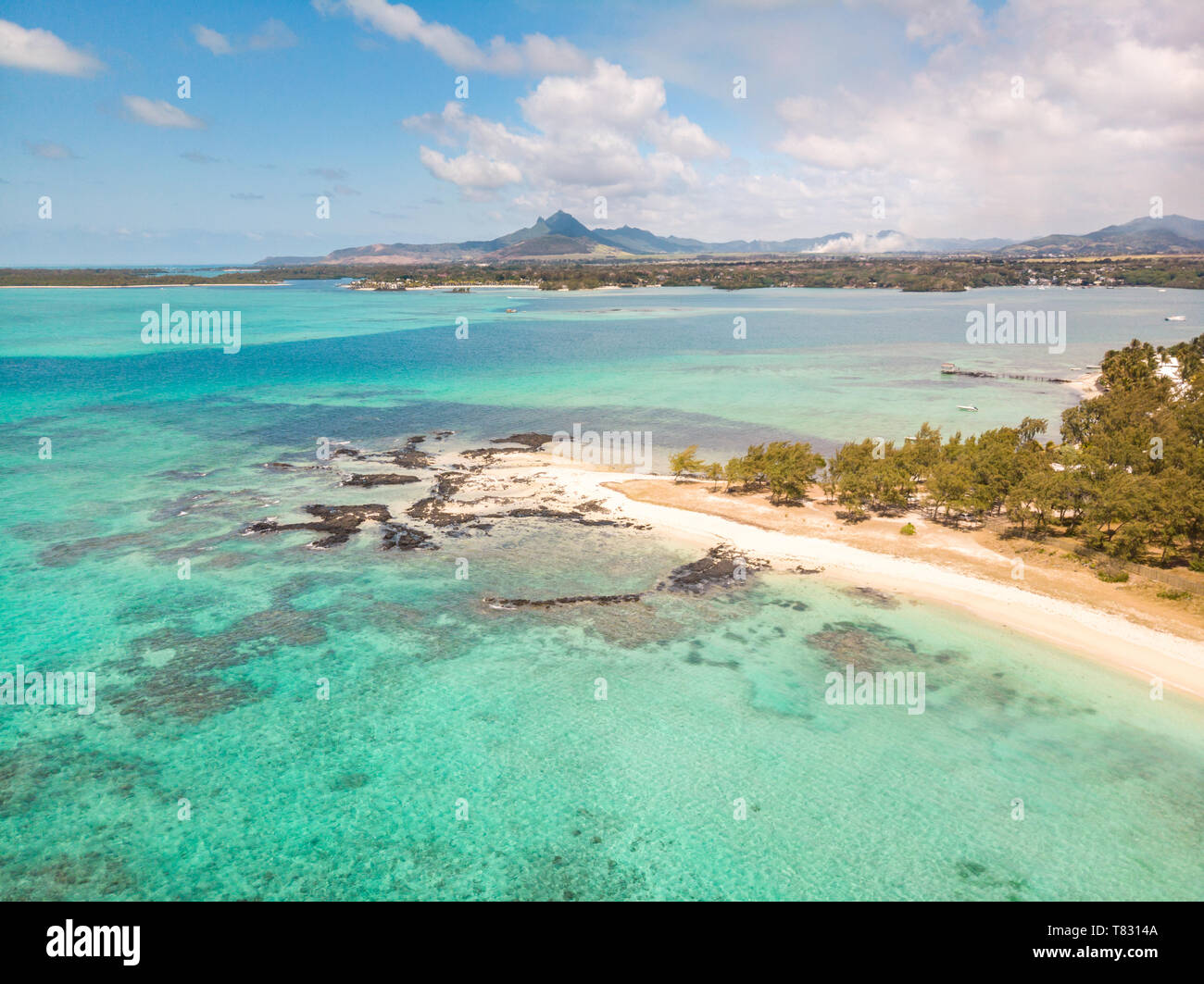 Aerial view of beautiful tropical beach with turquoise sea. Tropical vacation paradise destination of D'eau Douce and Ile aux Cerfs Mauritius Stock Photo