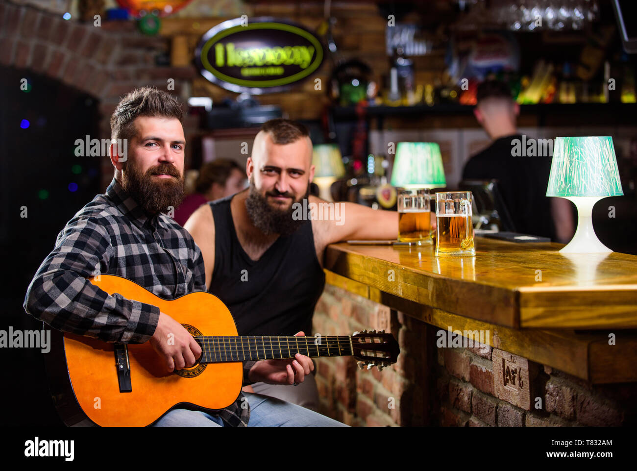 Man Play Guitar In Bar Cheerful Friends Relax With Guitar Music