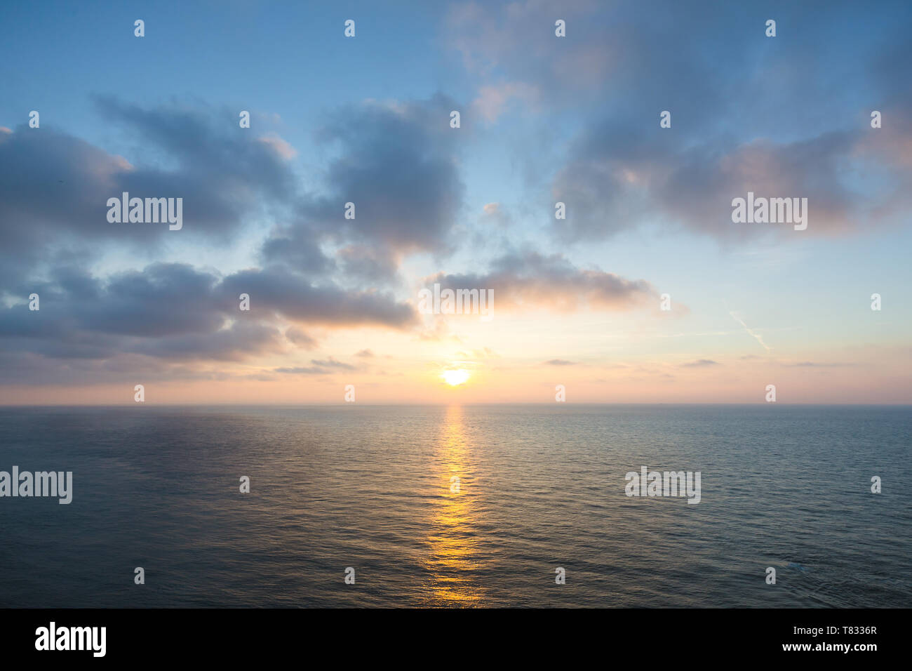 Beautiful sunset sky over sea hi-res stock photography and images - Alamy