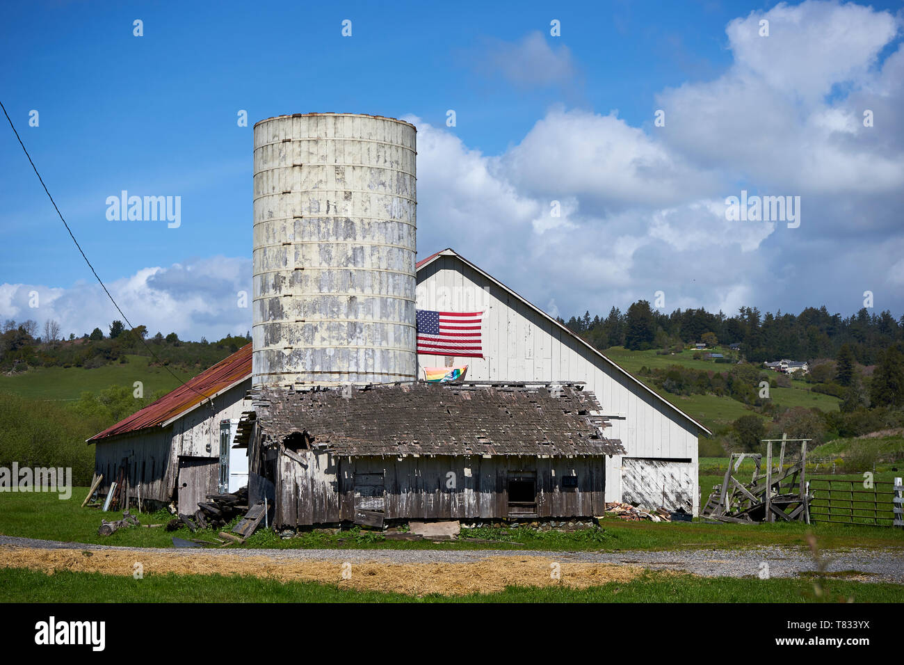 Barn with American flag on a country estate in rural Freestone, Sonoma County, California. Stock Photo