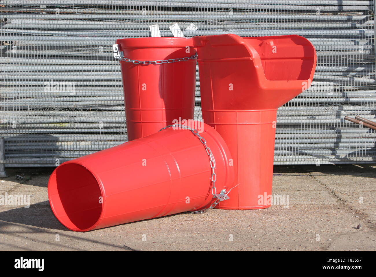 Brand new rubbish chute sections displayed in a builders merchant's
