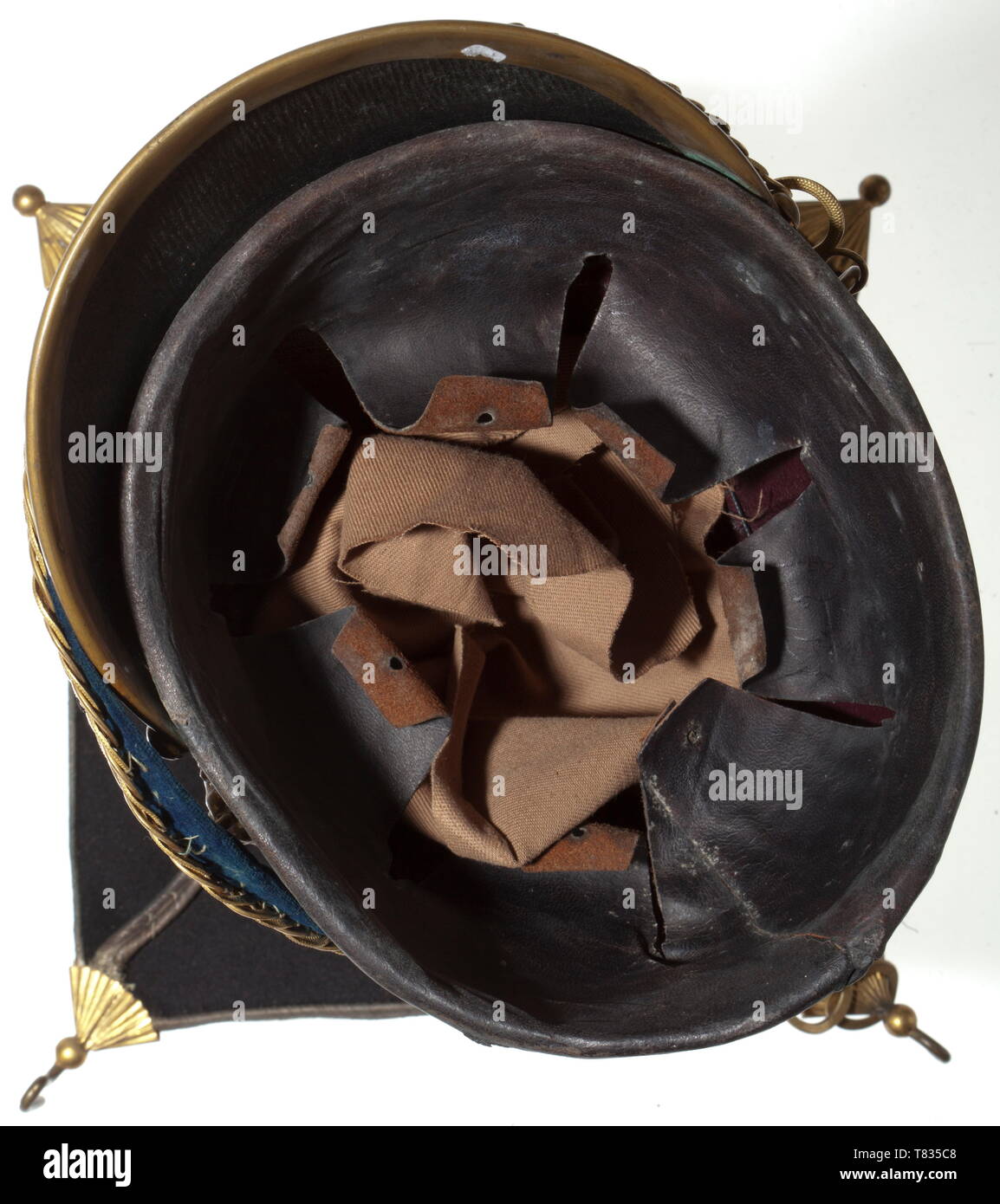 A czapka M 1845 for enlisted men of the lanciers The body of black leather with a black wool felt cover and silver piping. Brass fittings (traces of gilding), radial emblem with numeral '3' in the centre, velvet-backed brass chin scales. Pompon and sheet metal rosette in the colours of France. Black-brown leather liner. Traces of usage and age. historic, historical, 19th century, Europe, 19th century, Additional-Rights-Clearance-Info-Not-Available Stock Photo