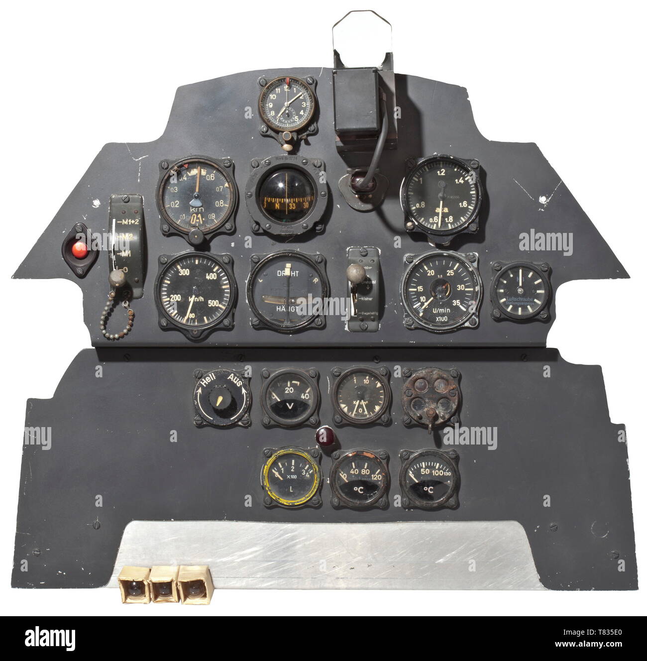 An instrument panel of the Me 109E 'Emil' fighter plane True to original reproduction of the frontal panelling using ORIGINAL instruments and switches (20 pieces) of the legendary German fighter aircraft. The above attached reflector sight (Revi, FL.52940) has new electric cables and can be operated by using a nominal voltage of 220 V. The pointed-post reticule can clearly be seen through the original Revi screen (FL.52271) which can be slid open. The standard and precision altimeter (FL.22320) as well as the airspeed indicator (FL.22230) are also functional (by means of a , Editorial-Use-Only Stock Photo