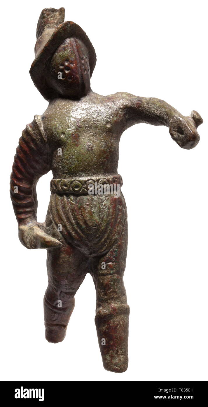 A Roman bronze figure depicting a gladiator 2nd/3rd century AD. Bronze, partly with bright green patina. Vivid depiction of a gladiator of the 'murmillo' type. Shield and feet are missing. Height 7 cm. One of the most famous representatives of the murmillo type gladiator was Spartacus, the leader of the slave revolt named after him (73 - 71 BC). Provenance: South German private collection, 1970s and later. historic, historical, Roman Empire, ancient world, ancient times, ancient world, Additional-Rights-Clearance-Info-Not-Available Stock Photo