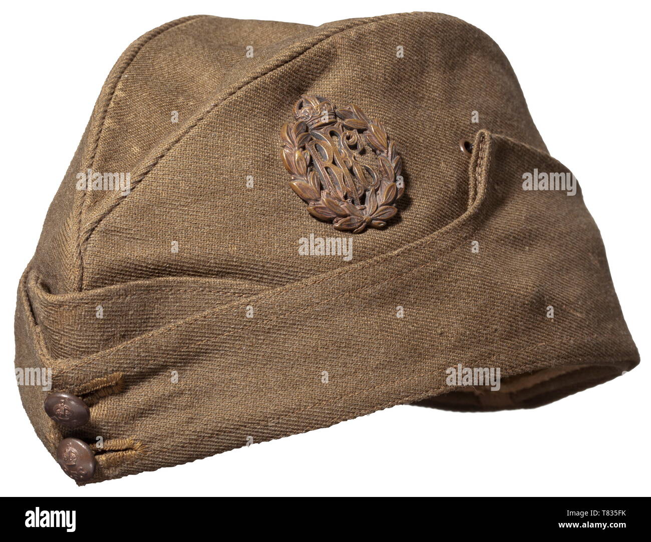 A field cap for NCOs/enlisted men of the Royal Flying Corps Officer's quality garrison cap of green-brown woollen cloth, the beige silk lining with maker 'Adamson & Co, Oxford', sweatband of green velvet. Sewn in on the left is the 'R.F.C.' badge in bronze issue for enlisted men, at the front two 12.5 mm buttons. Slight signs of usage and age. historic, historical, troop, troops, armed forces, military, militaria, army, wing, group, air force, air forces, 20th century, Editorial-Use-Only Stock Photo