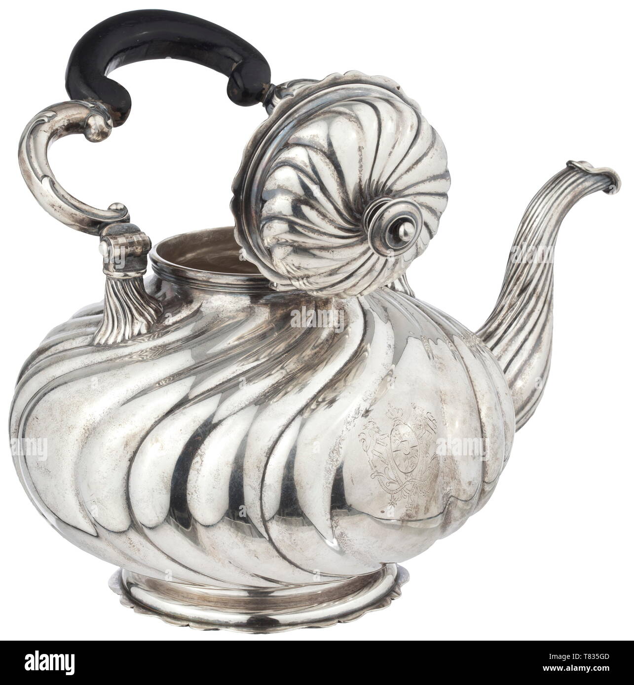 Ludwig II of Bavaria (1845 - 1886) - a tea-pot with a warmer Circa 1870. Round body flattened on both sides, gadrooned, 800 silver, on the bottom a mark of fineness with crescent moon and crown as well as a mark of the court jeweller 'Ed. Wollenweber', tubular spout, hinged lid, folding volute handle with blackened wood grip, crowned royal monogram and the Bavarian coat of arms. Corresponding silver warmer with holder for the burner, also decorated in a Neo-Baroque style. Signs of age and use. Total height circa 35 cm. Total weight circa 2,400 g., Additional-Rights-Clearance-Info-Not-Available Stock Photo