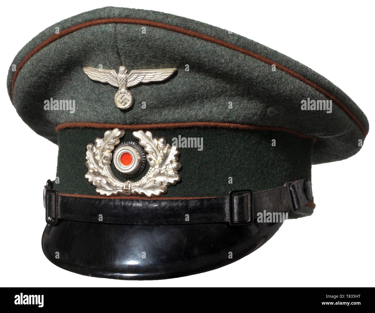A visor cap for enlisted men/NCOs of the motorcycle battalions Made of field-grey wool cloth with dark green cap band and copper brown piping. Silver-plated non-ferrous metal insignia, black patent leather strap. Yellow silk liner, 'Deutsche Wert Arbeit' stamped in silver under the maker´s label. Beige leather sweat band. A very rare branch colour, only in use for a short time. historic, historical, army, armies, armed forces, military, militaria, 20th century, Editorial-Use-Only Stock Photo