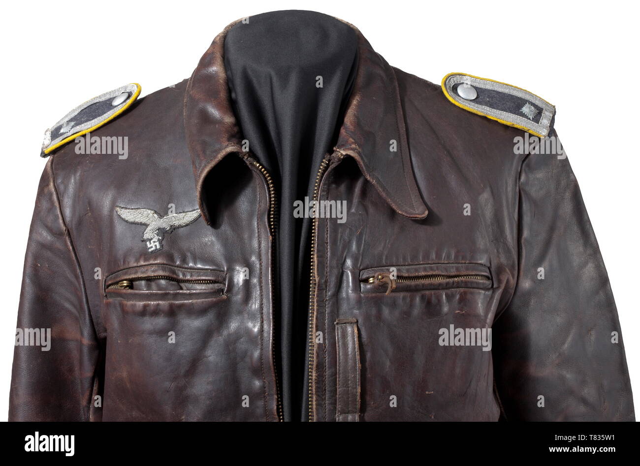 A leather jacket for a fighter pilot in the rank of an NCO Brown leather  with looped shoulder boards, zipper ("Ritsch"), "PRYM" press buttons, brown  lining, hand-embroidered officer's eagle sewn on. A