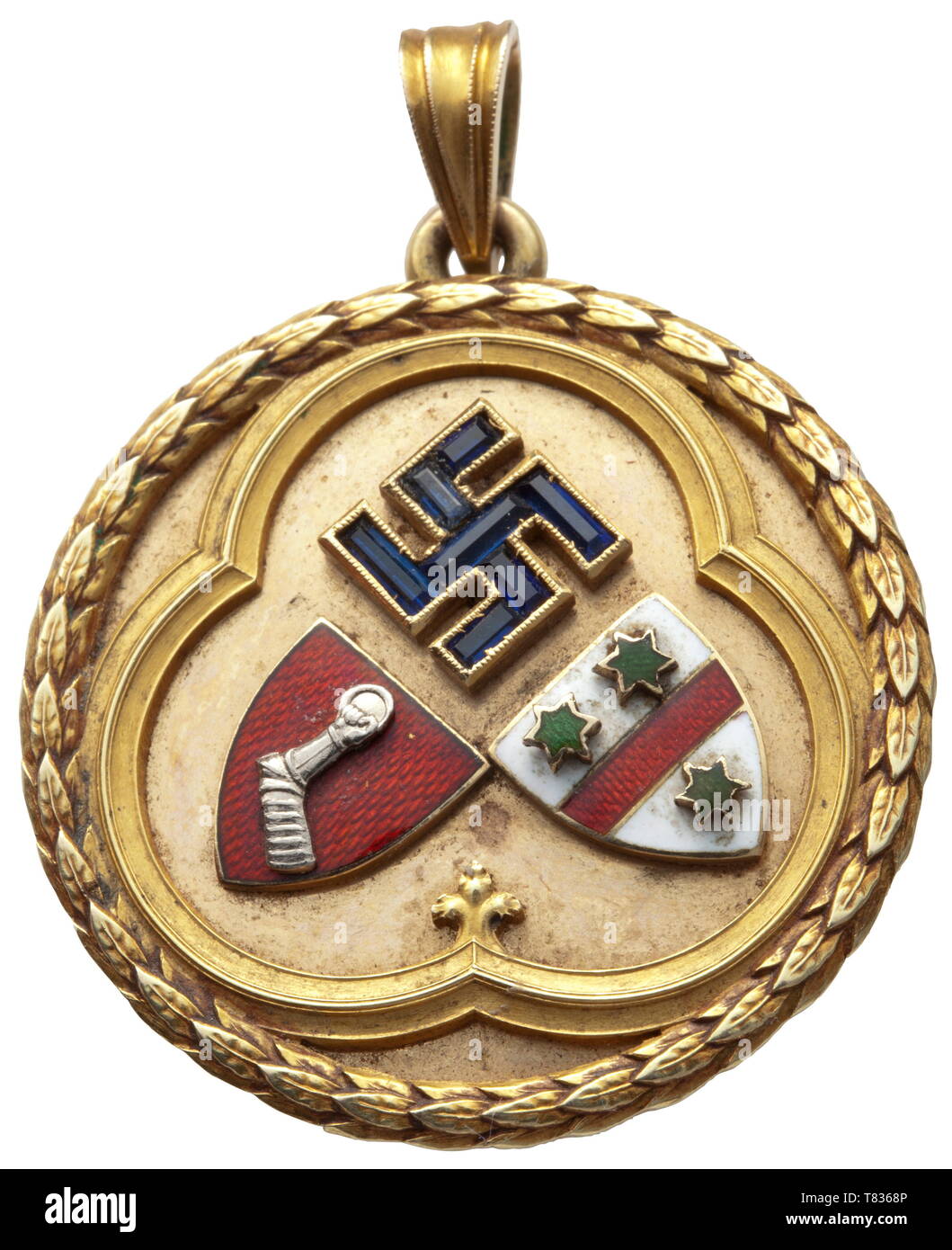 Hermann and Emmy Göring - a House Order of Loyalty, 1935 Gold, bordered by a laurel wreath. In the centre an applied swastika with set sapphires surmounting the enamelled coats of arms of the Göring and Sonnemann families, all within a Gothic trefoil. On the back the dedication engraving 'Ida Ott Für Treue Weihnachten 1935 Hermann-Emmy Göring'. Diameter 30.5 mm, 14 g. Very rare (only one very similar piece is known) distinction awarded to long-standing employees of Göring's private surroundings. historic, historical, 20th century, 1930s, NS, National Socialism, Nazism, Thir, Editorial-Use-Only Stock Photo