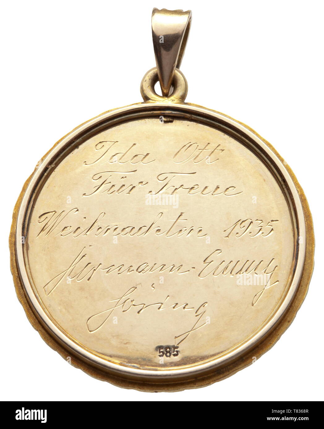 Hermann and Emmy Göring - a House Order of Loyalty, 1935 Gold, bordered by a laurel wreath. In the centre an applied swastika with set sapphires surmounting the enamelled coats of arms of the Göring and Sonnemann families, all within a Gothic trefoil. On the back the dedication engraving 'Ida Ott Für Treue Weihnachten 1935 Hermann-Emmy Göring'. Diameter 30.5 mm, 14 g. Very rare (only one very similar piece is known) distinction awarded to long-standing employees of Göring's private surroundings. historic, historical, 20th century, 1930s, NS, National Socialism, Nazism, Thir, Editorial-Use-Only Stock Photo