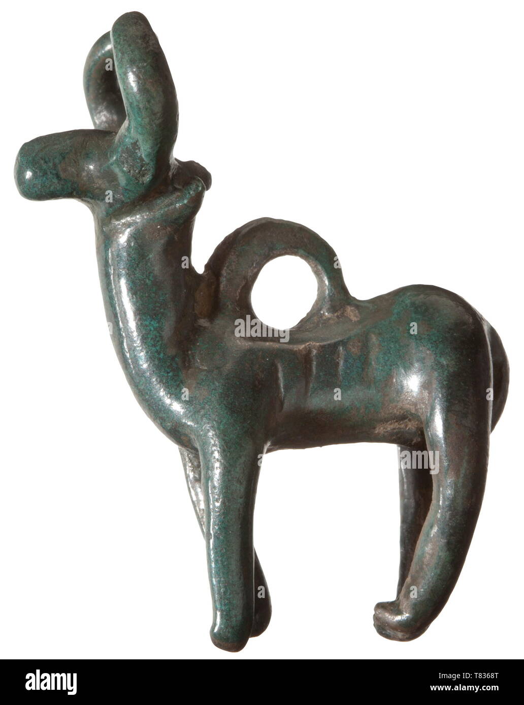 A Central European bronze ox Bronze Age, circa 1000 BC. Bronze with fine emerald patina. Three-dimensionally shaped stylised ox with inward bent horns and closed legs. Suspension ring on the back. Fine condition and patina. Provenance: South German private collection, 1970s and later. historic, historical, prehistory, Additional-Rights-Clearance-Info-Not-Available Stock Photo