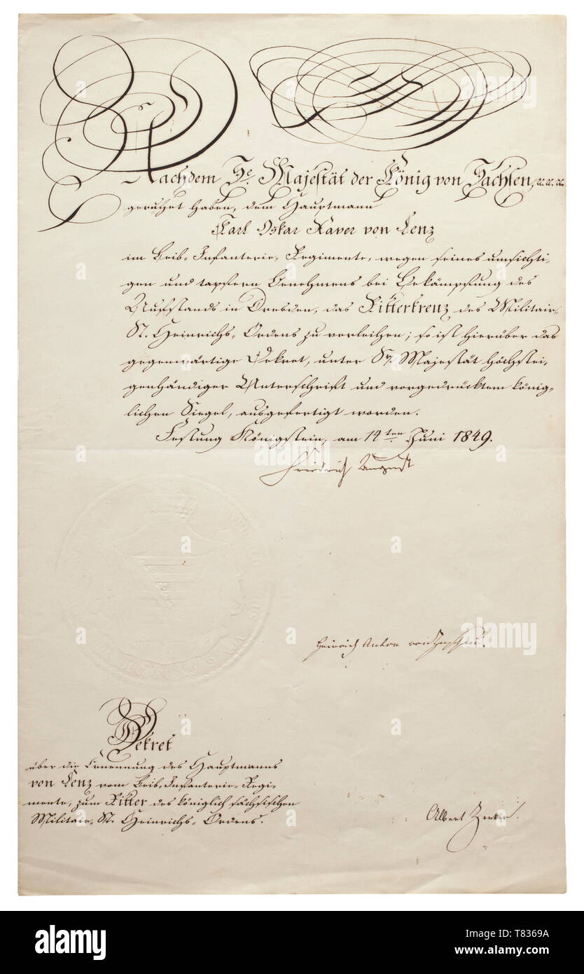 An award document for the Knight's Cross of the Military Order of St. Henry The decree signed by King Friedrich August II of Saxony on Fortress Königstein on 14 June 1849 and issued to 'Hauptmann Karl Oskar Xaver von Lenz im Leib-Infanterie-Regimente, wegen seines umsichtigen und tapferen Verhaltens bei Bekämpfung des Aufstandes in Dresden' (Captain Karl Oskar Xaver von Lenz in the Leib Infantry Regiment in view of his circumspect and brave behavior in combat at the Dresden uprising) for the Knight's Cross of the Military Order of St. Henry. With, Additional-Rights-Clearance-Info-Not-Available Stock Photo
