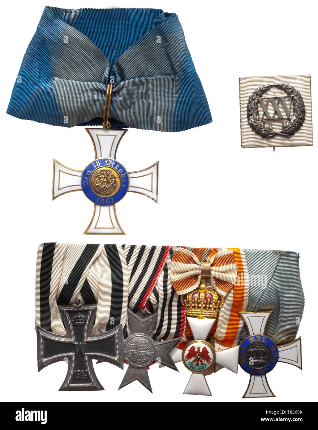 An orders and documents grouping of Geheimer Oberregierungsrat Martin Roedenbeck Order of the Crown 2nd Class in Gold by the Sy and Wagner firm, Berlin ('S.W.' punch mark in the medallion cylinder), with neck ribbon in award presentation case with document dated 1918. Four-piece orders clasp with the Iron Cross 2nd Class of 1914 on a white-black ribbon, Merit Cross for War Aid 1916, Order of the Red Eagle 3rd Class with crown and bow in gold by the Wagner firm, Berlin, Order of the Crown 3rd Class by the same firm. Included are the corresponding , Additional-Rights-Clearance-Info-Not-Available Stock Photo