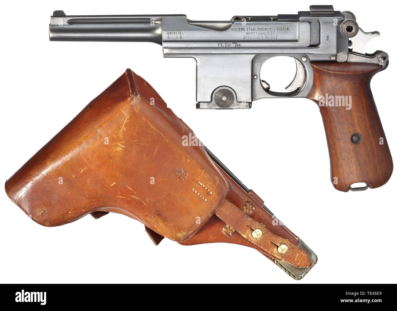 A Bergmann mod. 1910/21, with holster Cal. 9 mm Bergmann, no. 5428. Matching numbers. Mirror-like bore. Produced by Pieper, Herstal. On barrel housing, below logo, signed 'M.1910/21', inventory no. 290, on the right of front sight base acceptance crown/DK/41. This indicates modification to mod. 1910/21 or arsenal overhaul under German occupation (starting in May 1940) in 1941. Complete, original bluing. Small and operational parts polished white. Extractor blued. Matching-numbered, smooth walnut grip panels. Magazine with S/N 8458. Almost mint condition. Comes with a light , Editorial-Use-Only Stock Photo
