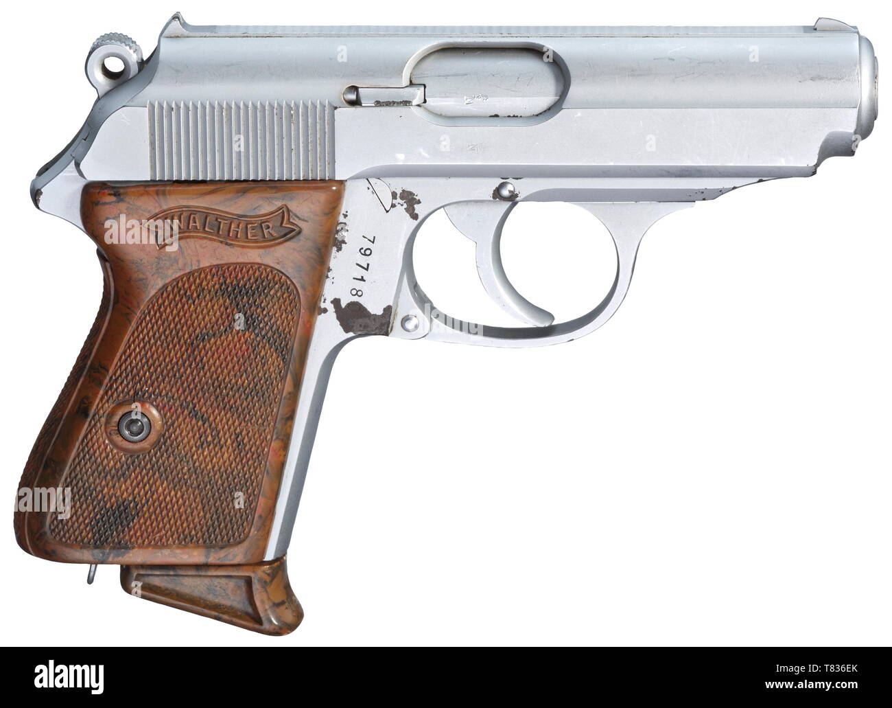 A Walther PPK ZM, matt chrome-plated Cal. 7.65 mm, no. 797180. Bright bore. 90Ã¸ safety. Without signal pin. Standard inscription. Original matt chrome plating. Small flaws on the right of frame, minimally at the muzzle. Mottled brown plastic grip panel. Correct, matt chrome-plated magazine with early brown extension. A very rare collector's item. Erwerbsscheinpflichtig. historic, historical, 20th century, Additional-Rights-Clearance-Info-Not-Available Stock Photo