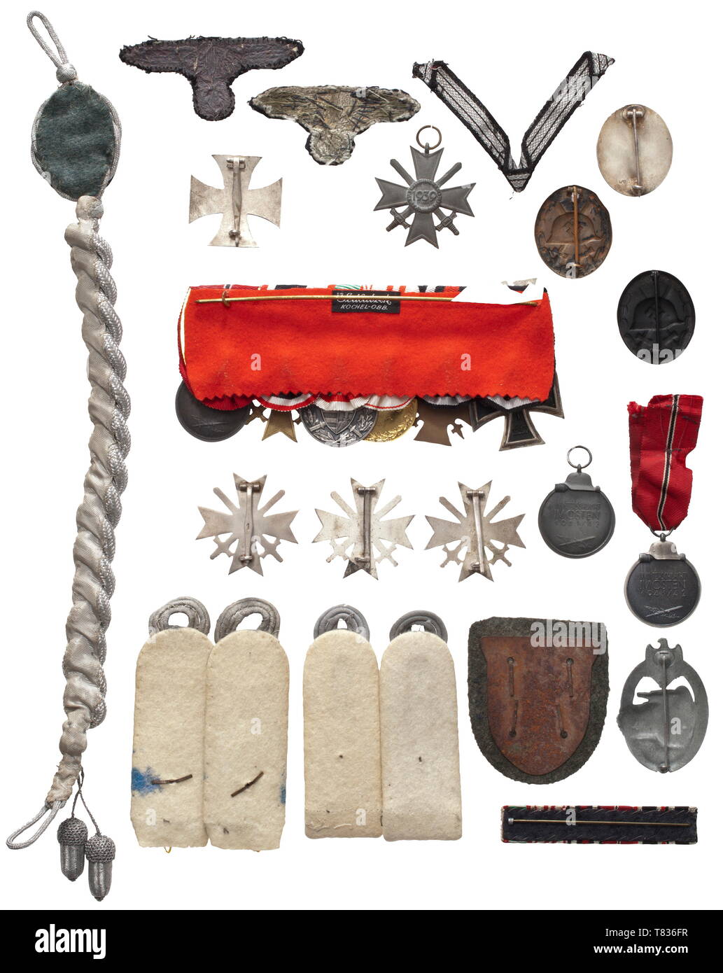 The estate of Hauptsturmführer Arthur Erdmann Large six-piece orders clasp (Iron Cross 2nd Class of 1914 with Repetition Clasp of 1939, Honour Cross of the World War 1914/18 for Combatants, Austrian and Hungarian War Commemorative Medals, War Merit Cross with Swords, Eastern Front Medal) with corresponding field orders clasp, an Iron Cross 1st Class of 1914 (piece from the 1930s), three War Merit Crosses 1st Class (each of silvered non-ferrous metal, two with maker 'L/11', '1'), a Panzer Assault Badge in Silver (zinc, maker 'R.K.'), a Krim Shield (paper missing), a War Meri, Editorial-Use-Only Stock Photo