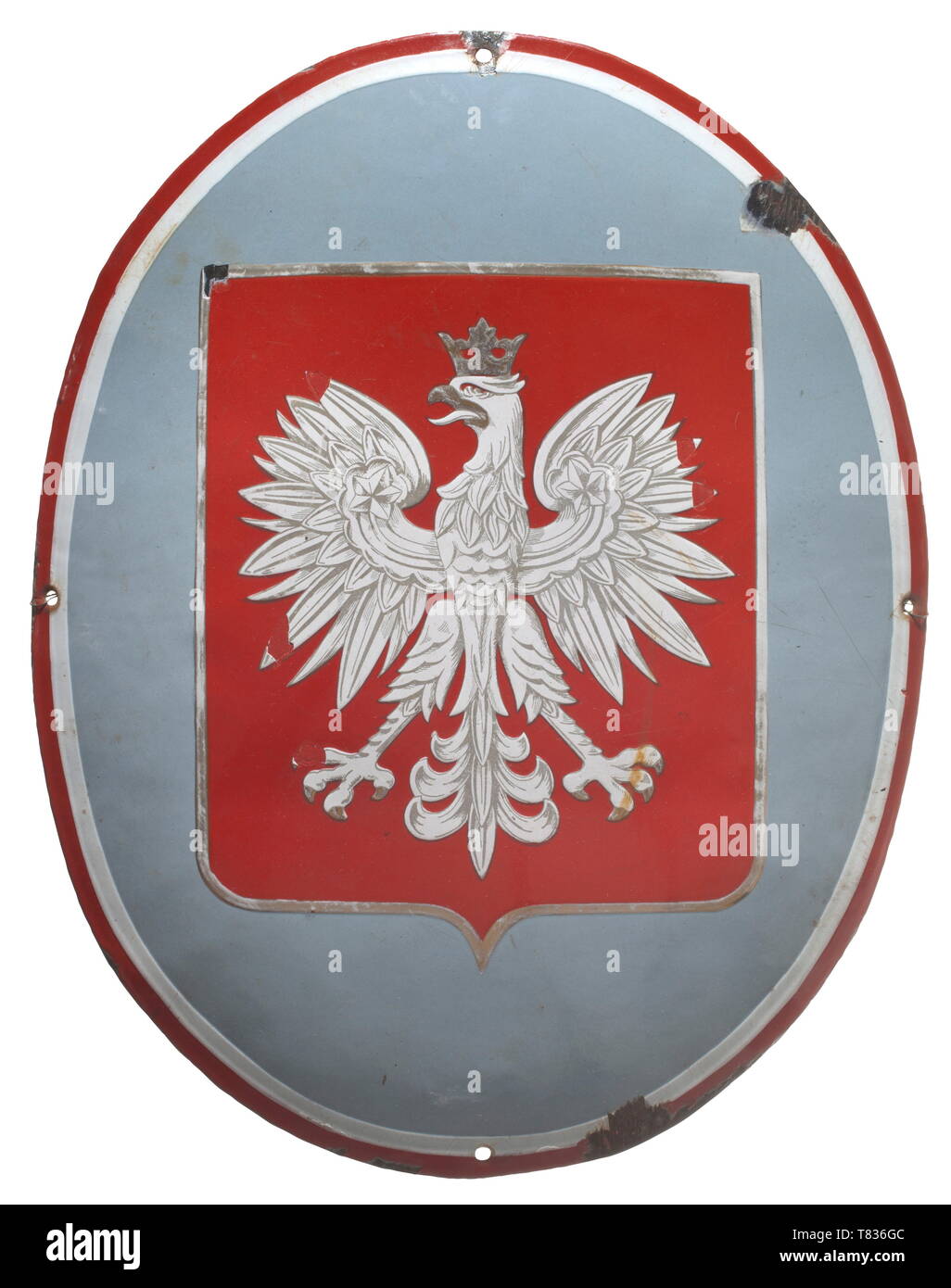 A sign of a Polish border station The convex sign made of sheet iron. The obverse applied with several layers of enamel. In the centre the Polish national eagle with red background. Border in the Polish national colours around the perimeter. Four fastening holes, size circa 40 x 51 x 4 cm. Signs of age and enamel damages. historic, historical, Poland, Europe, European, 20th century, Additional-Rights-Clearance-Info-Not-Available Stock Photo