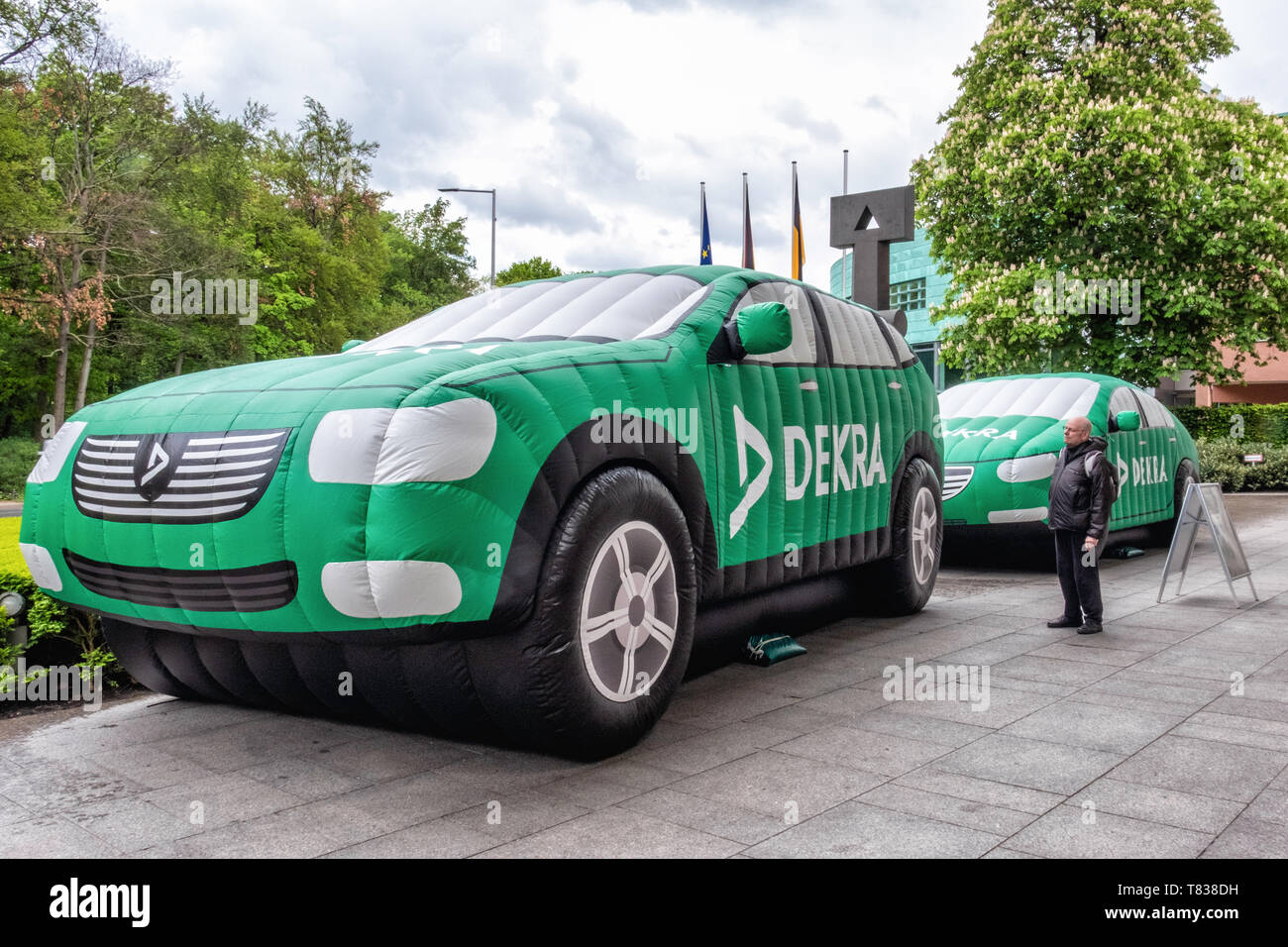 Germany, Berlin-Tiergarten. 9th May 2019.. DEKRA vehicle inspection company  installs giant inflatable cars outside the Baden-Württemberg State Ministry  building. The inflated vehicles are part of a road safety campaign to  demonstrate a