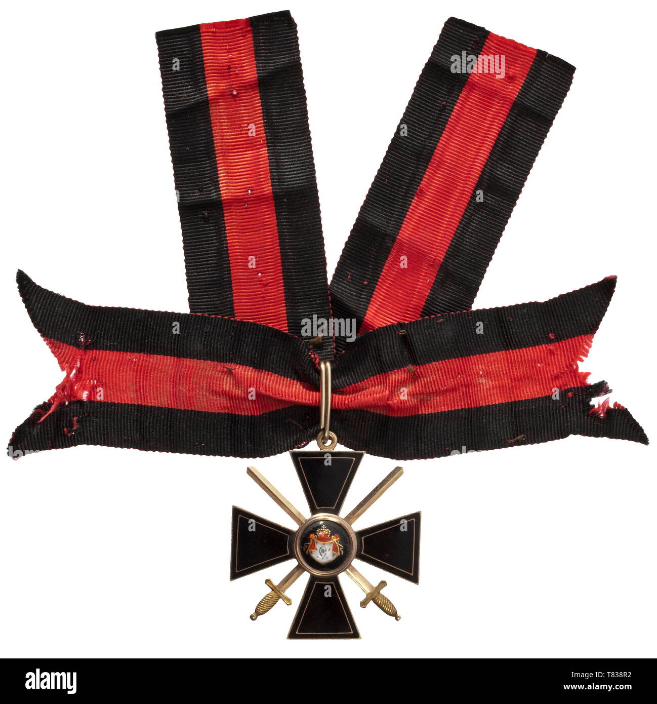 An Order's Cross 4th Class with Swords of the Order of St. Vladimir This exemplar in gold, made in circa 1860, is one of the famous 'Black Series' of the Russian orders system. Probably due to a fashion trend of the time, these decorations were commissioned by private order and produced completely in black instead of red enamel. The cross arms are perfectly flatly polished in the highest enamel work traditions of the period, and are especially desirable because of the fine linear gold décor and edging. The swords are fashioned in gold using bicol, Additional-Rights-Clearance-Info-Not-Available Stock Photo