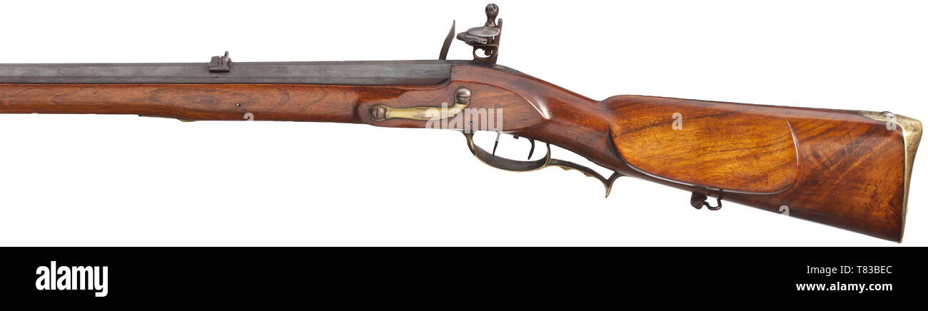 A 'Jäger' rifle, a so-called 'Jüngere Kurhessische Jägerbüchse' Octagonal barrel in 15 mm calibre, length 73 cm, on the upper side a dovetailed brass front sight and one-flap sight, at the breech on the left stamped 'G&WP' (Georg und Wilhelm Pistor). Brass vent hole screw. French-style flintlock with brass pan, set trigger. Bridle with an old repair. Walnut full stock with brass furniture. The patch box with bullet extractor and scraper. Iron ramrod with brass tip. Length 112 cm. Extremely rare 'Jäger' rifle in appealing condition, reworked profe, Additional-Rights-Clearance-Info-Not-Available Stock Photo