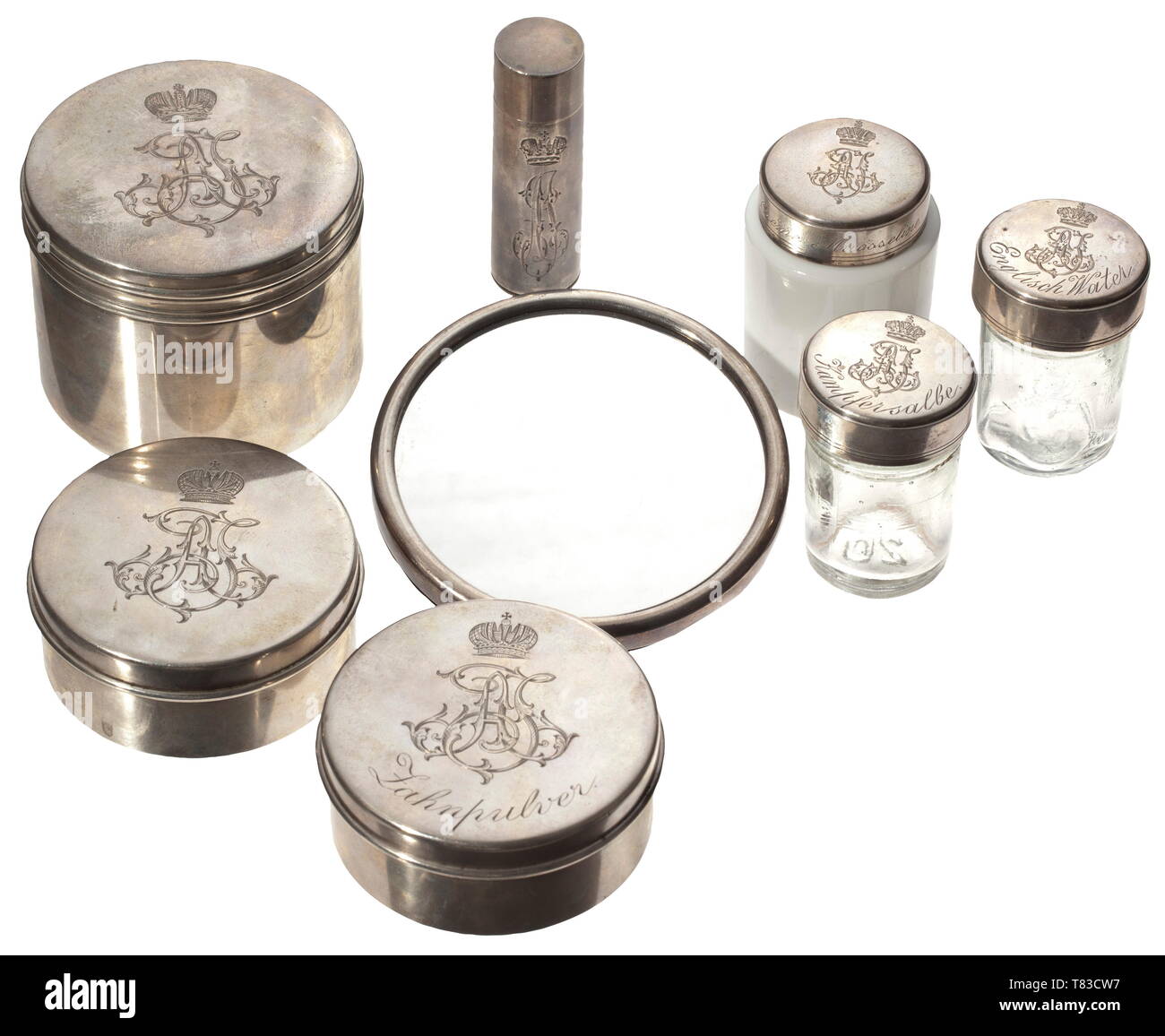 Grand Duchess Alexandra Josipovna (1830 - 1911) - an eight-piece travel toilet-set Court jewellers Grachev Brothers, St. Petersburg, after 1892. Silver, the insides gilt, porcelain and glass. All silver pieces engraved with the monogram 'AJ' surmounted by the grand ducal crown. Cyrillic manufacturer´s marks (two pieces punched with 'OM'), marks with the double-headed eagle and St. Petersburg marks of 19th century, Additional-Rights-Clearance-Info-Not-Available Stock Photo