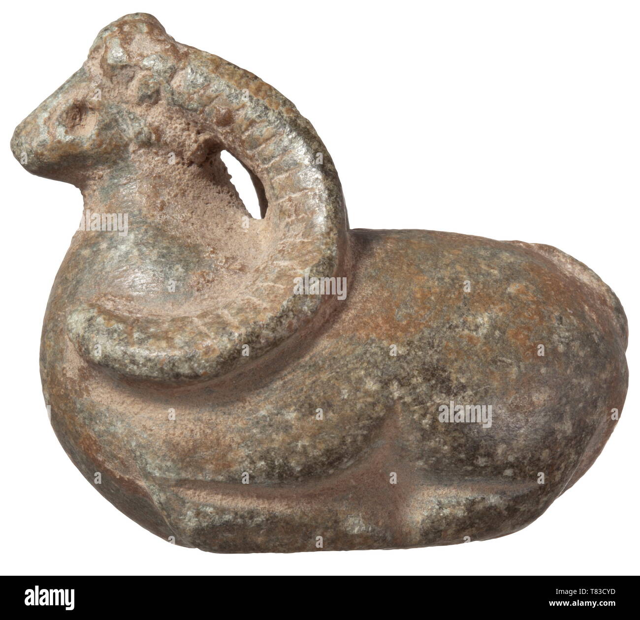 A North Syrian idol of an ibex 4th millenium BC. Stylised, lying ibex of greenish stone with widely protruding openwork horns. Length circa 5 cm. Provenance: Böblingen private collection, 1970s. historic, historical, ancient world, Additional-Rights-Clearance-Info-Not-Available Stock Photo