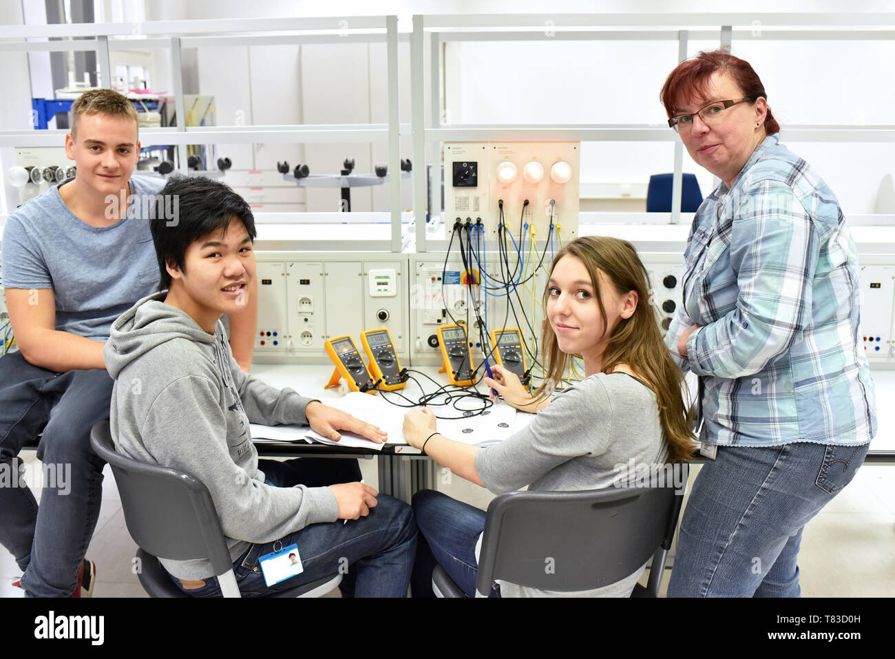 technical vocational training in industry: young apprentices and trainers in the classroom Stock Photo
