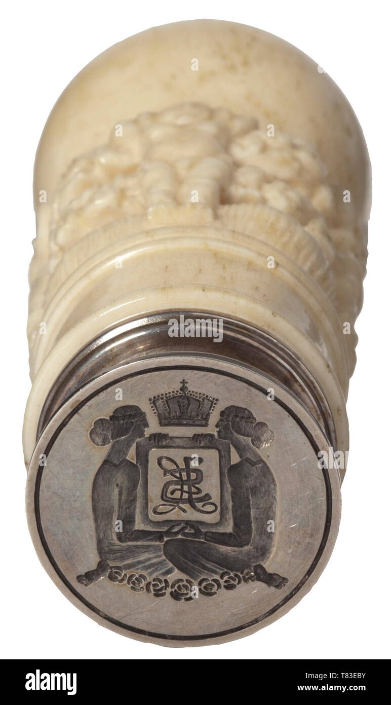 Princess Stephanie von Hohenzollern-Sigmaringen (1895 - 1975) - a personal seal Very delicate Art Nouveau ivory handle with flower garlands and cupids around the perimeter. Cut into the silver seal matrix two Art Nouveau females holding the princess's crowned monogram. Height 95 mm. With comprehensive correspondence from the House Hohenzollern-Sigmaringen, including 6 handwritten congratulatory cards, a handwritten note and a signed large-size photo of Prince Wilhelm von Hohenzollern (1864 - 1927), four handwritten letters by his second wife Adel, Additional-Rights-Clearance-Info-Not-Available Stock Photo