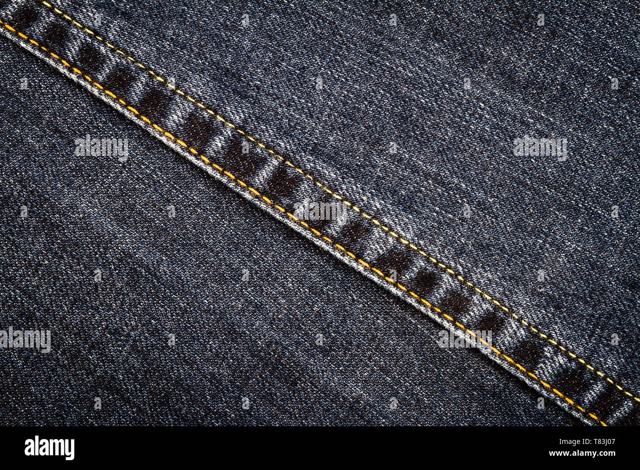 Black jeans texture. Denim jeans fabric background with a seam Stock ...