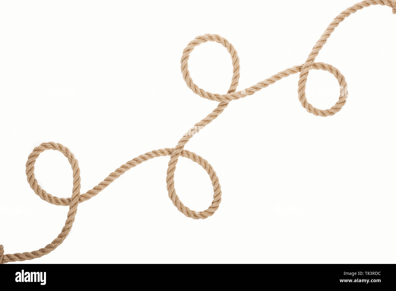 https://c8.alamy.com/comp/T83RDC/long-brown-and-jute-rope-with-curls-isolated-on-white-T83RDC.jpg