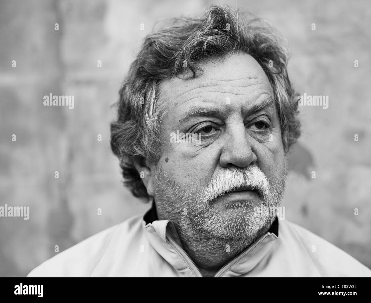 Black and white portrait of a middle aged caucasian man with gray hair ...