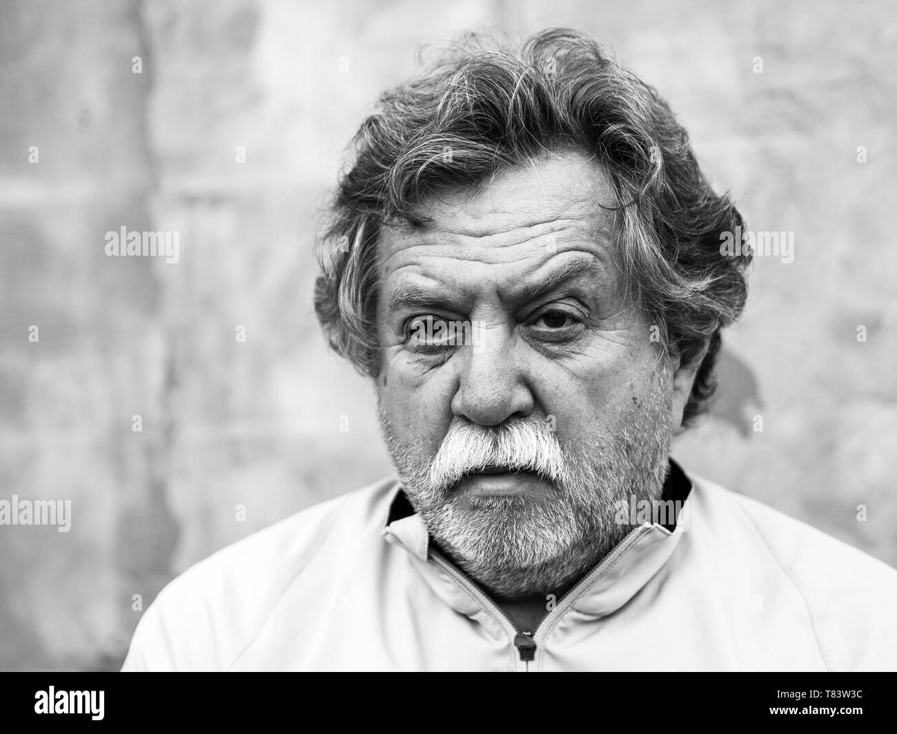 Black and white portrait of a middle aged caucasian man with gray hair ...