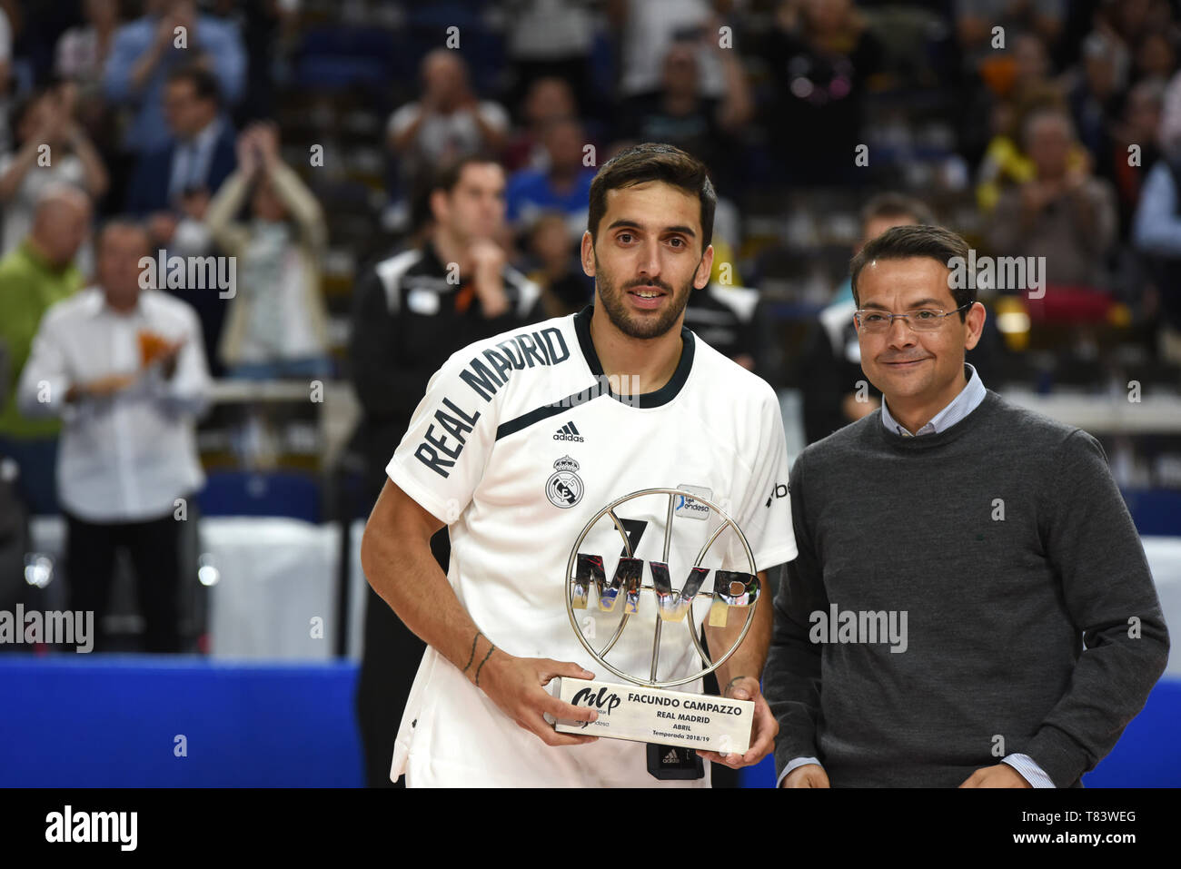 Facundo Campazzo, #11 of Real Madrid seen holding an MVP trophy during the 2018/2019 Liga Endesa Regular Season Game (day 31) between Real Madrid and Movistar Estudiantes at WiZink center in Madrid. Final Score: Real Madrid 109 - 92 Movistar Estudiantes. Stock Photo