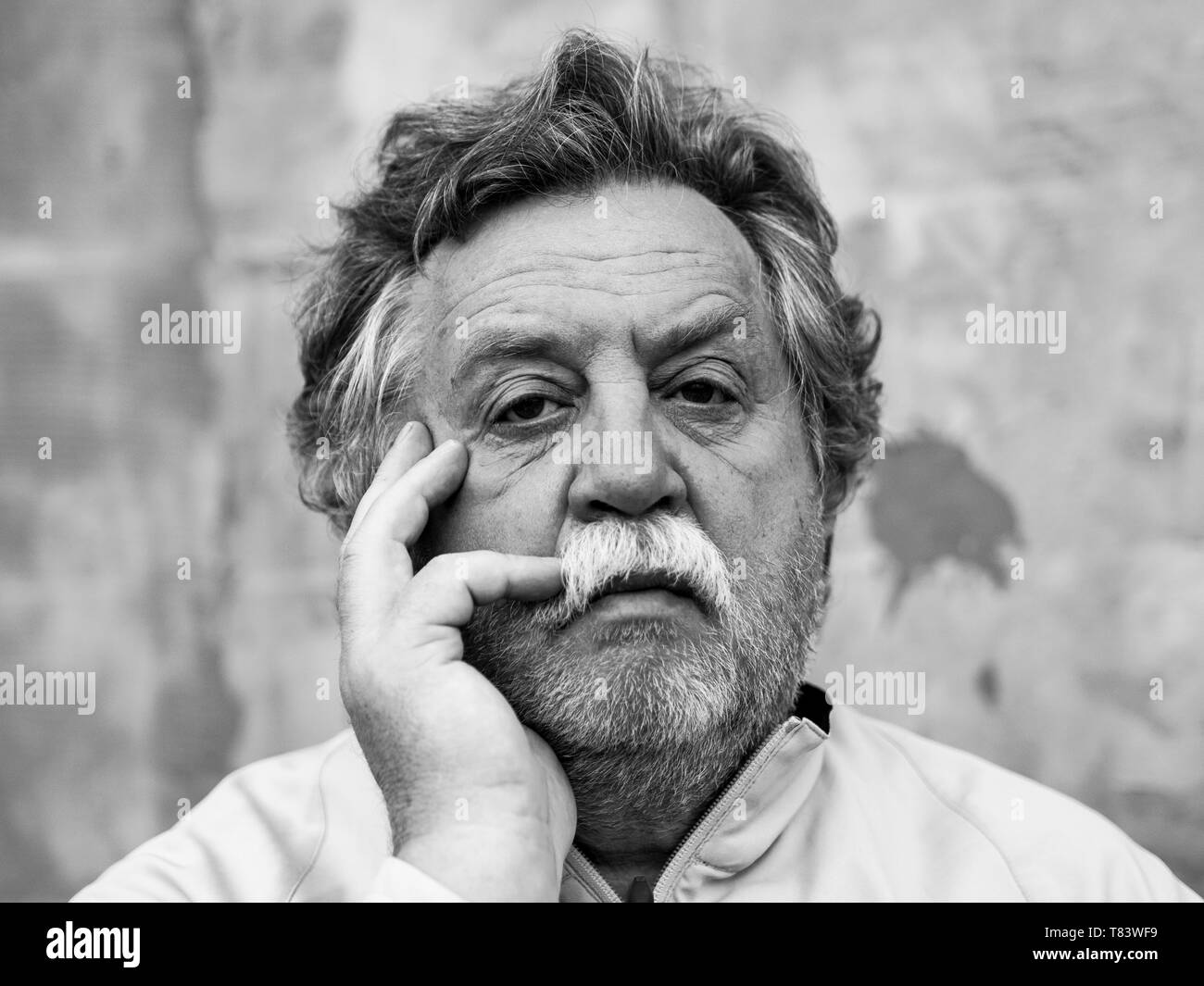 Black and white portrait of a middle aged caucasian man with gray hair ...