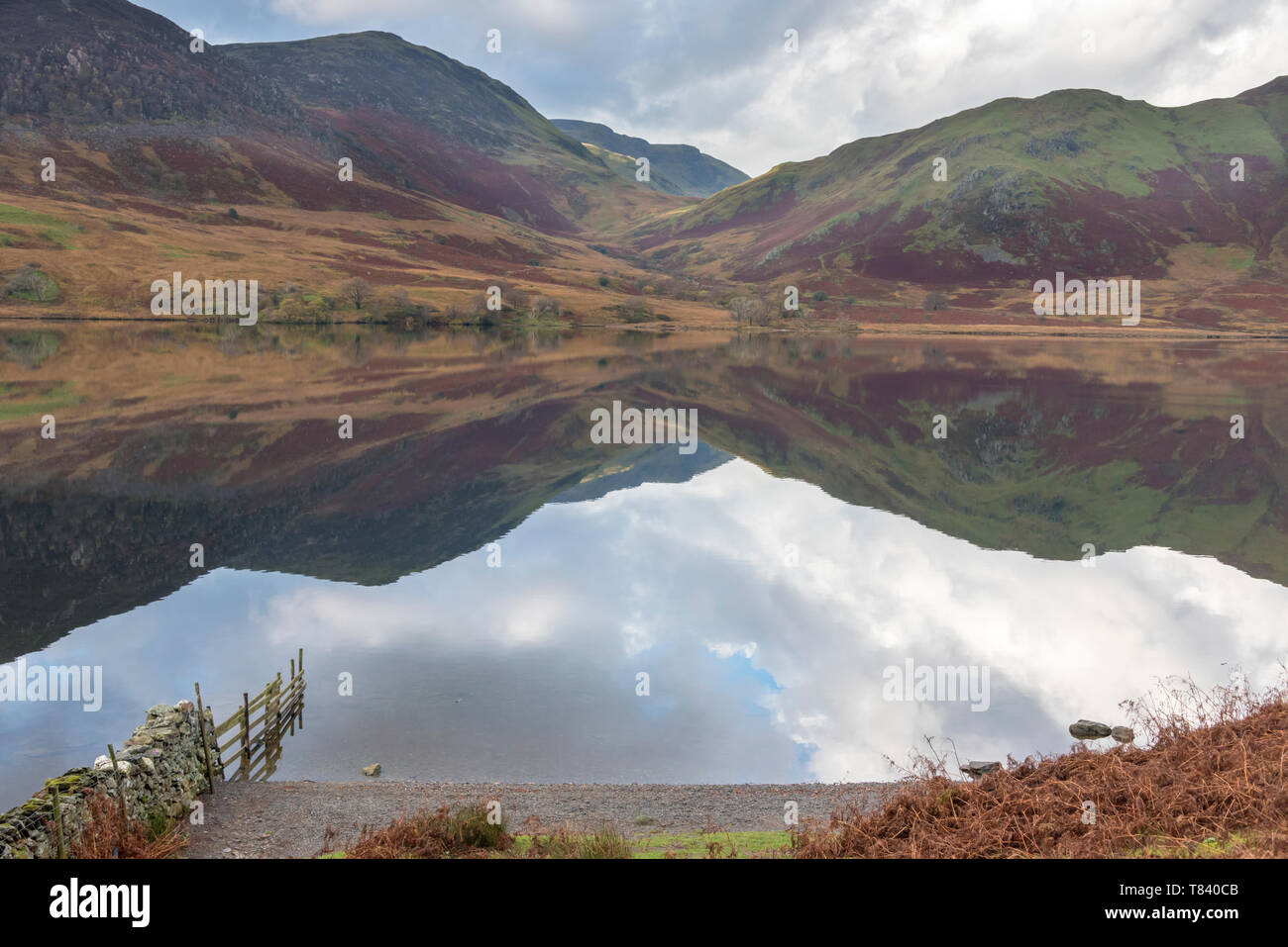 The early morning view is on the shore of Crummock Water. Crummock Water is one of the many lakes in The Lake District National Park,UK. Stock Photo