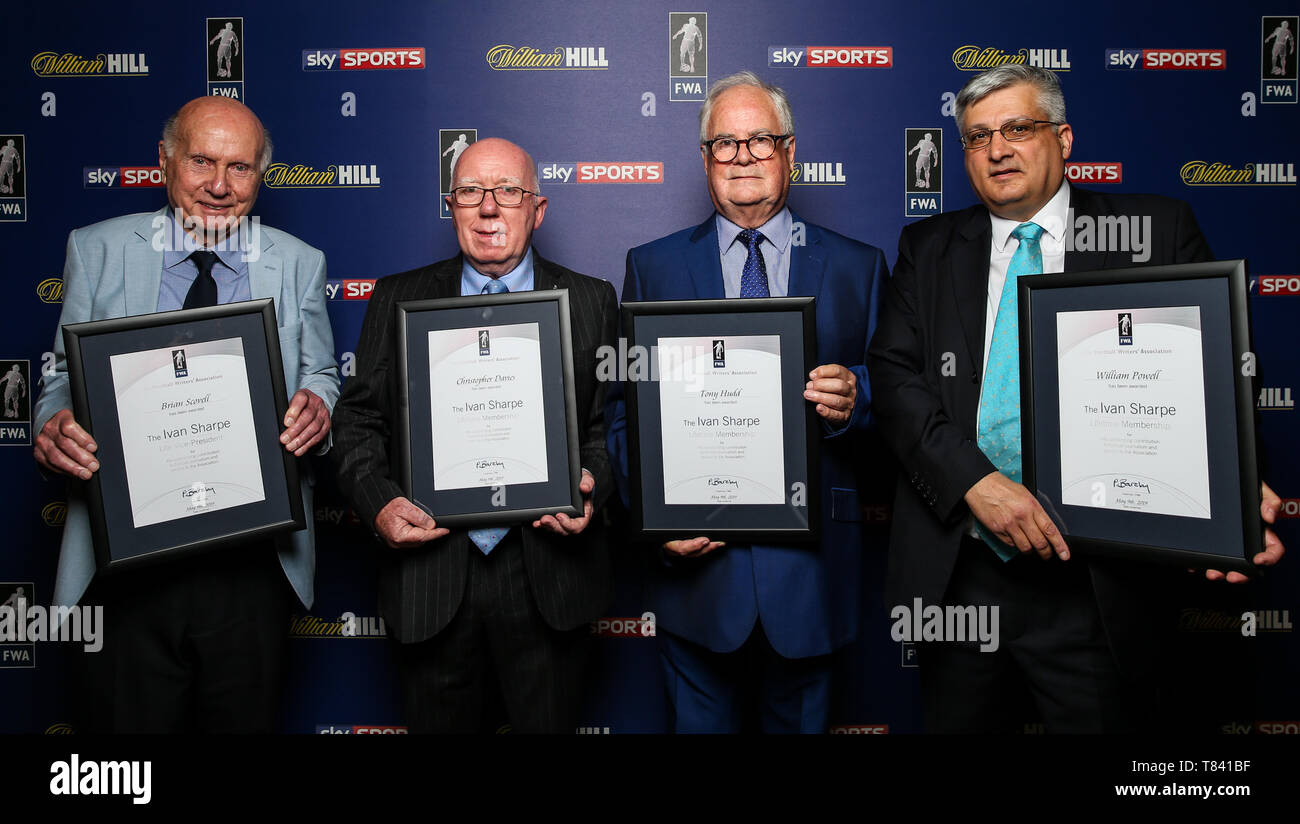 Brian Scovell, Christopher Davies, Tony Hudd and William Powell during the FWA Footballer of the Year Dinner at the Landmark Hotel, London. Stock Photo