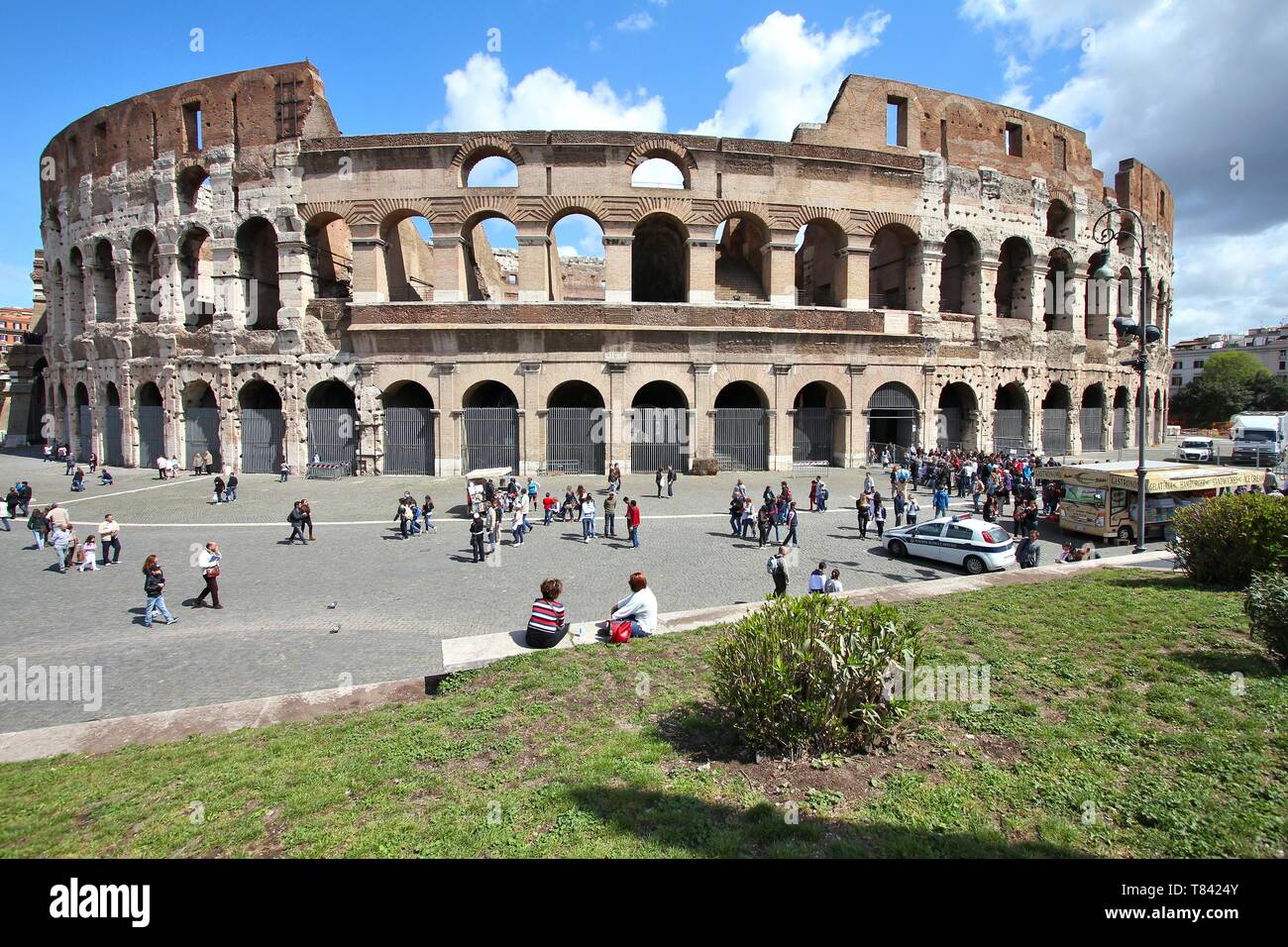 ROME, ITALY - APRIL 10, 2012: People visit Colosseum in Rome. According to Euromonitor, Rome is the 3rd most visited city in Europe (5.5m internationa Stock Photo