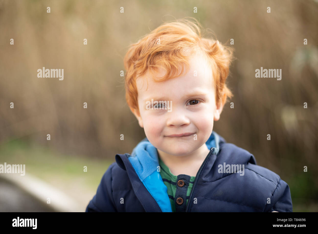 Portrait of boy with red hair Stock Photo