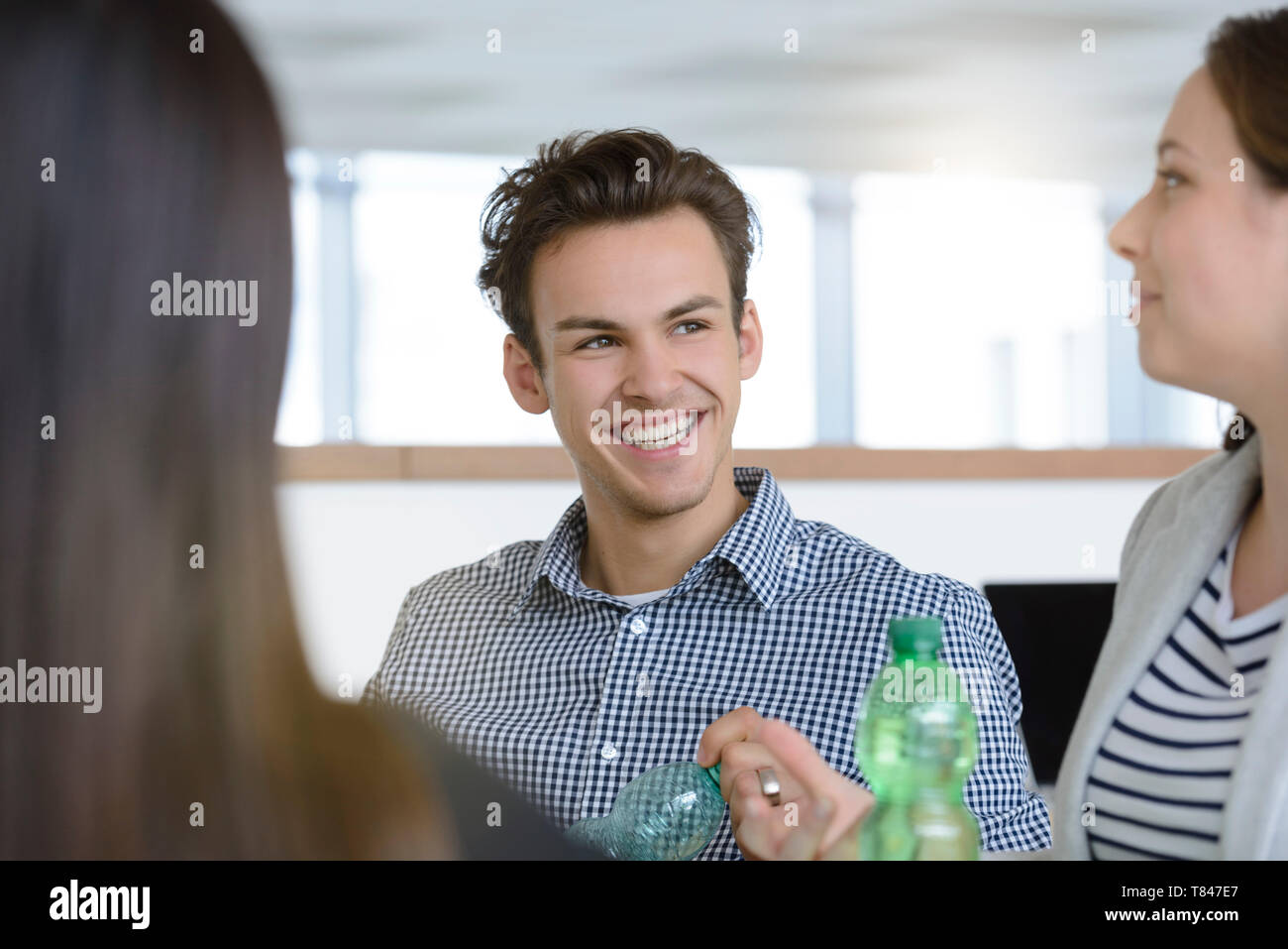 Colleagues having discussion in office Stock Photo