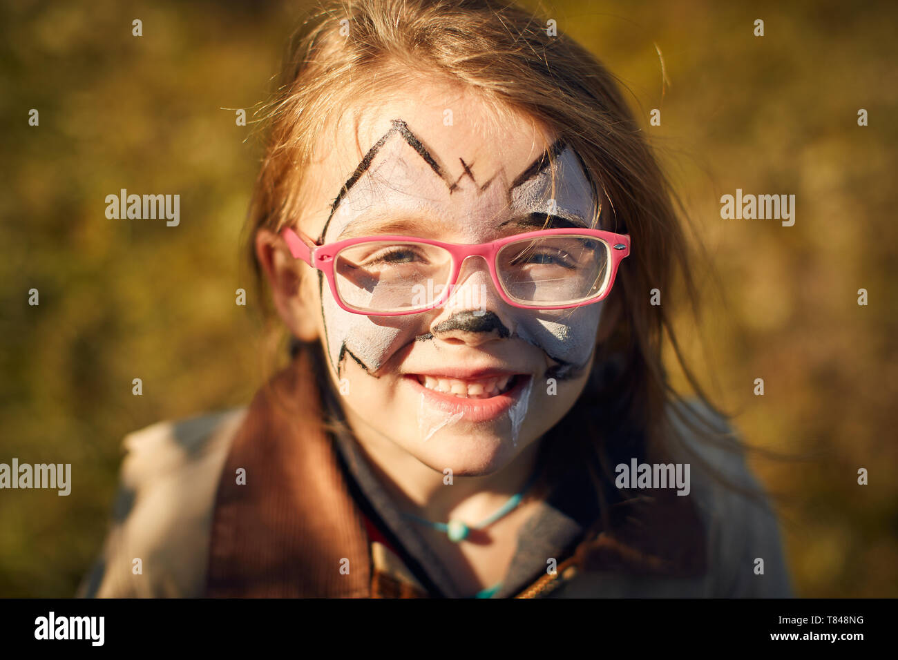 Girl with face painted Stock Photo