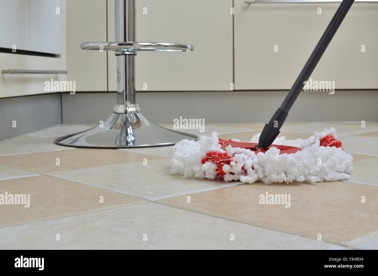 Mopping kitchen floor hires stock photography and images Alamy