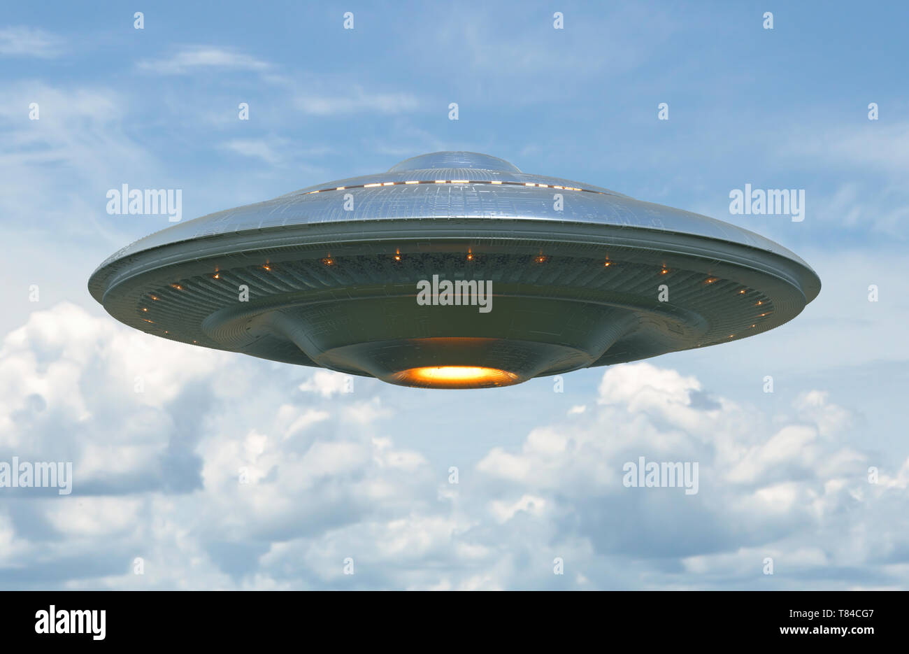 Unidentified flying object on light blue neutral background. Image with clipping path included. Stock Photo
