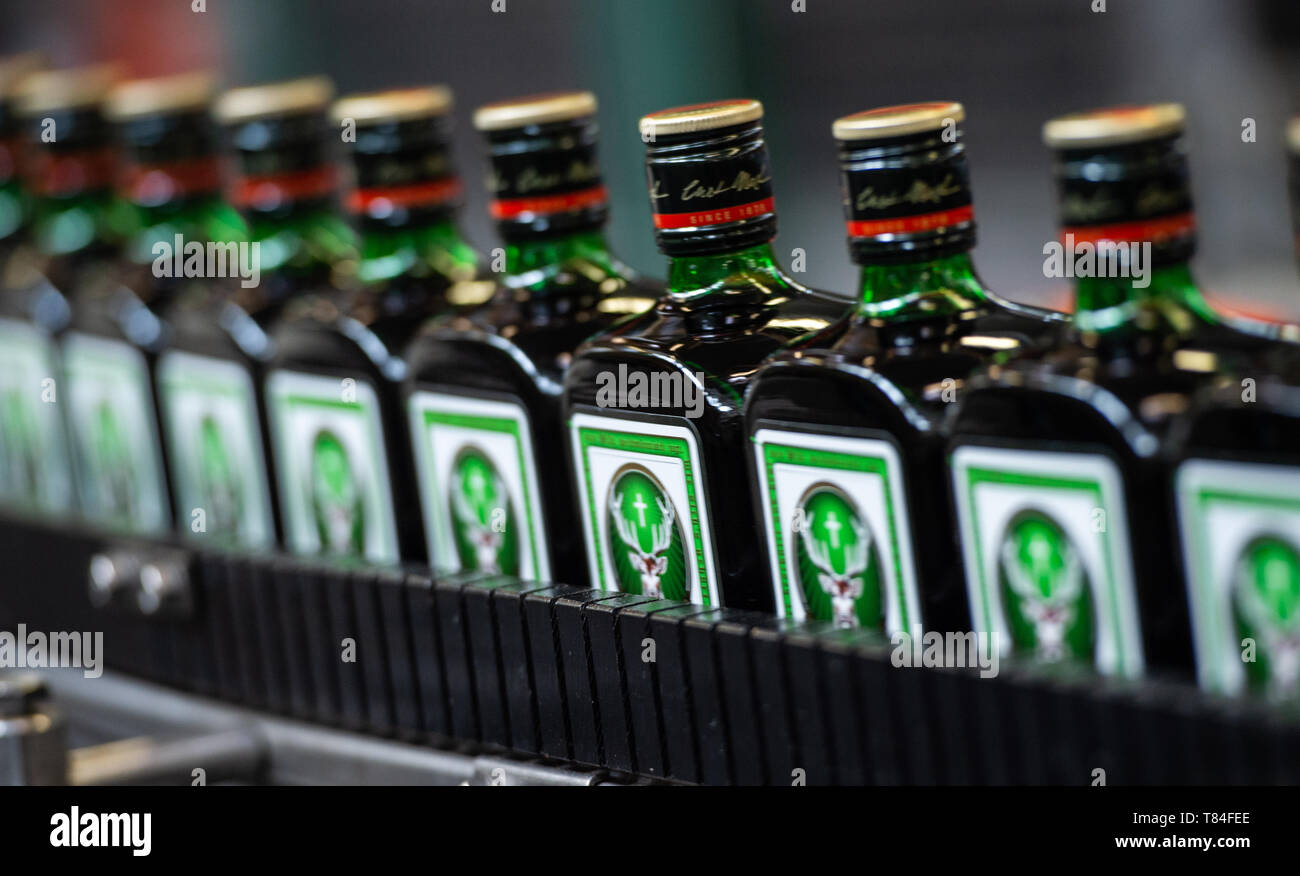 10 May 2019, Lower Saxony, Wolfenbüttel: Jägermeister bottles are  transported on a conveyor belt in the newly expanded filling plant of the  beverage manufacturer Jägermeister. With this expansion, Jägermeister has,  according to
