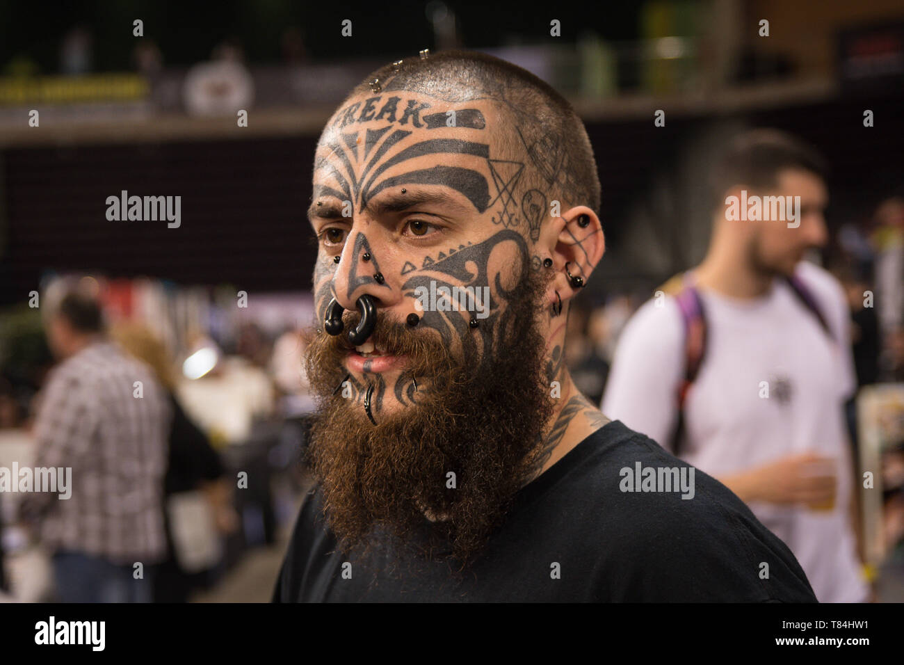 Athens, Greece. 10th May, 2019. A man seen with a full face tattoo during the festival.Thousands of tattoo artists all over the world took part during the 13th Athens International Tattoo Convention and they also made tattoos to people who were interested. Credit: Nikolas Joao Kokovlis/SOPA Images/ZUMA Wire/Alamy Live News Stock Photo