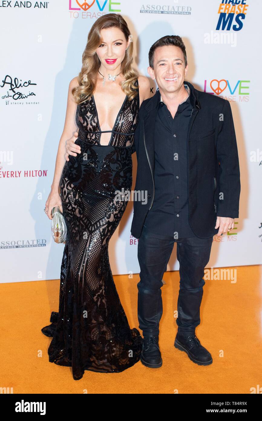 Andrea Faustino, David Faustino at arrivals for 26th Annual Race to Erase MS Gala, The Beverly Hilton, Beverly Hills, CA May 10, 2019. Photo By: Adrian Cabrero/Everett Collection Stock Photo