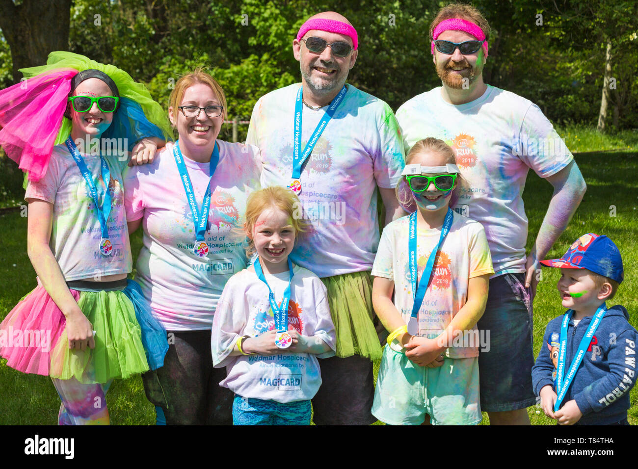 Weymouth, Dorset, UK. 11th May 2019. Weldmar's last ever Colour Run takes place at Weymouth to raise funds for the charity. Participants have fun getting covered in brightly coloured powder paint. Credit: Carolyn Jenkins/Alamy Live News Stock Photo